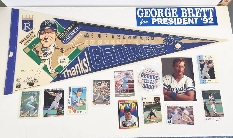 lot 1046 image: Amazing George Brett Lot - Extremely Rare Pieces - Serial #d Pennant - Incredibly Rare Bumper Sticker, Cards 