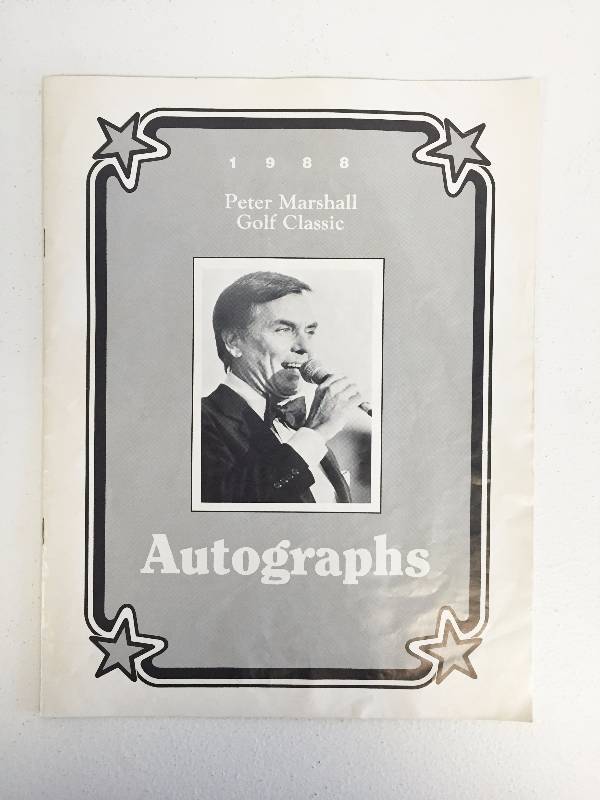 lot 1048 image: 1988 Peter Marshall Golf Classic Program loaded with Celebrity Hollywood Stars  Royals & Chiefs Autographs - Must See