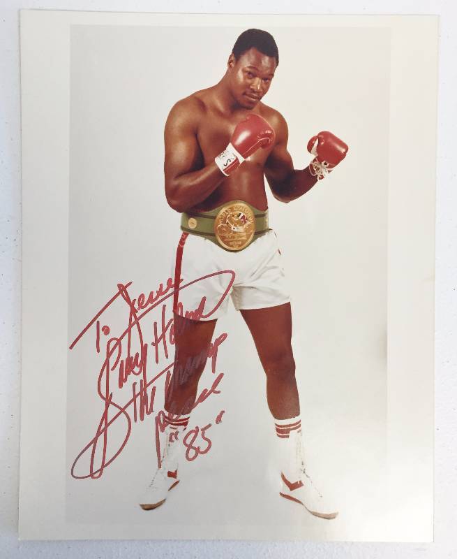 lot 1049 image: Rare Larry Holmes Boxing Champion - Autographed Photo - Vintage 1985 Autograph - Rare Peace Inscription