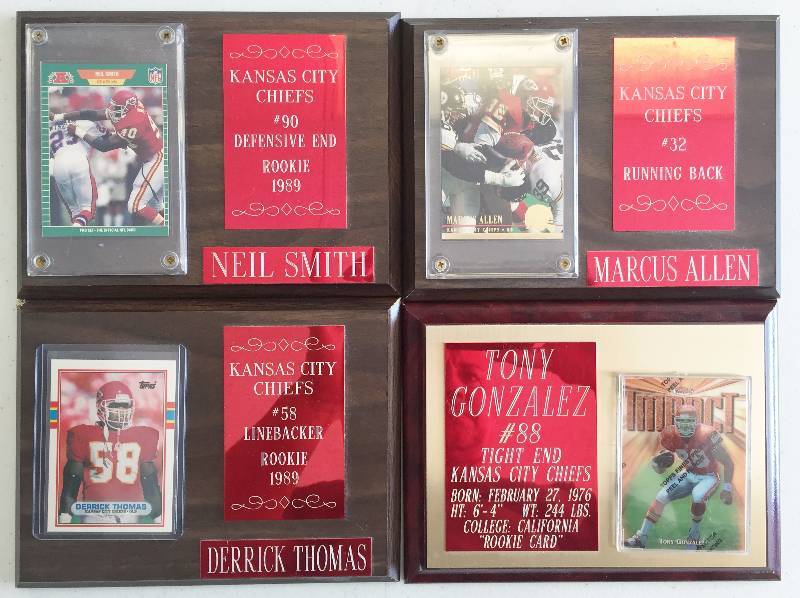 lot 1065 image: Amazing Kansas City Chief Legends Plaque Displays - Derrick Thomas, Tony Gonzalez, Niel Smith, Marcus Allen - Must See Rookie Cards Included