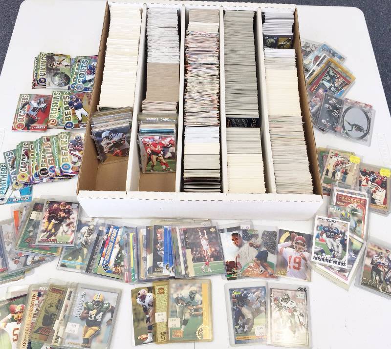lot 1082 image: 5,000 Count Box Jam Packet With Football Superstars - Rookies - Inserts & More - Book Value Over $500 - A True Treasure Hunt