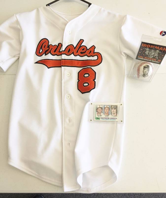 lot 1085 image: Cal Ripken Lot - Incredible Lot - KidsFemale Size Jersey - 1982 Topps Rookie Card - Factory Sealed PhotoBall - WoW
