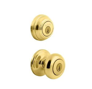 lot 50987 image: Kwikset Juno Polished Brass Exterior Entry Door Knob and Single Cylinder Deadbolt Combo Pack