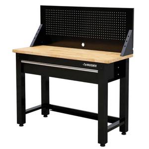 lot 51625 image: Husky 4 ft. Solid Wood Top Workbench in Black with Pegboard and 1 Drawer