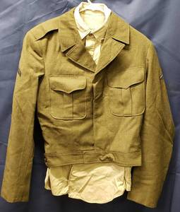 lot 503 image: WWII Era Military Uniform with Military Staff Support Trial Defense Star Patch & Bag, (Shirt Size Unknown), 2Pair Tan Trousers Size Unknown5 Button Fly
