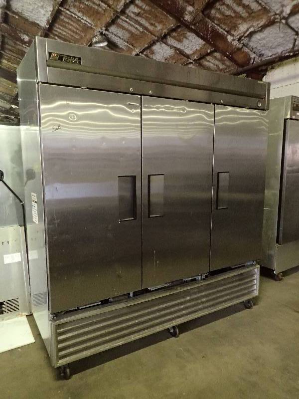 lot 590 image: True 3 Door Stainless Commercial Freezer On Casters