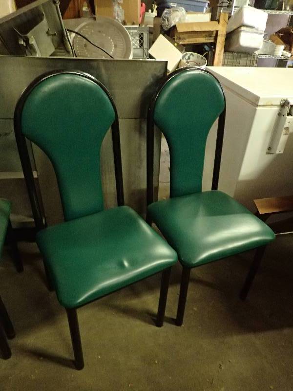 lot 606 image: Pair Of Black Frame Metal Chairs With Padded Green Vinyl Seats