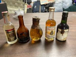 lot 60383 image: vintage liquor bottles