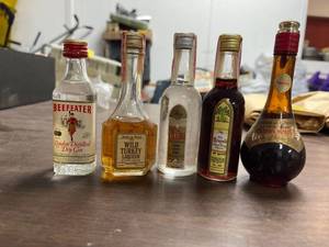 lot 60385 image: vintage liquor bottles