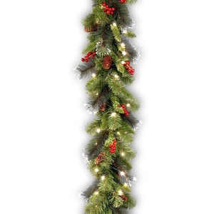 lot 2753 image: National Tree Company 9 Crestwood Spruce Silver Bristle Garland With Pine Cones, Berries, Glitter & 50 Clear Lights