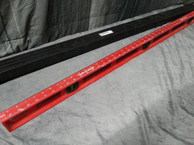 lot 1050 image: 48  Empire Task Force level, yard stick measuring device with the storage and carrying case.