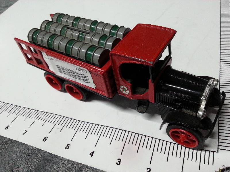 lot 1057 image: 1992 Edition by Ertl is this Texaco oil barrel truck bank.  Christmas is coming soon