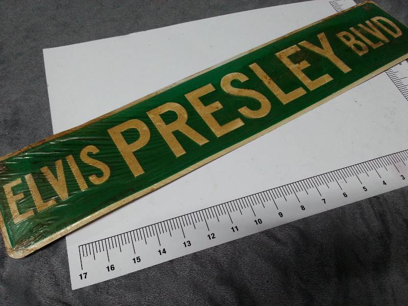 lot 1036 image: Dress your bedroom wall or shop up with this lightweight aluminum Elvis Presley Street sign