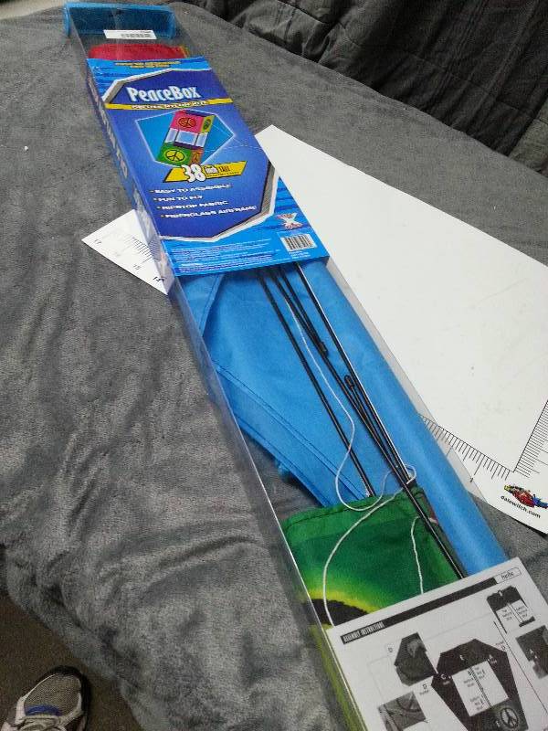lot 1048 image: Peace Box 38 inch long Deluxe Nylon Kite ready to assemble and fly