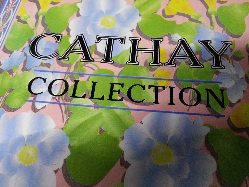 lot 1031 image: Cathay Collection doll Aggie with certificate of authenticity 1 of 5,000.  I think shes made of porcelain.