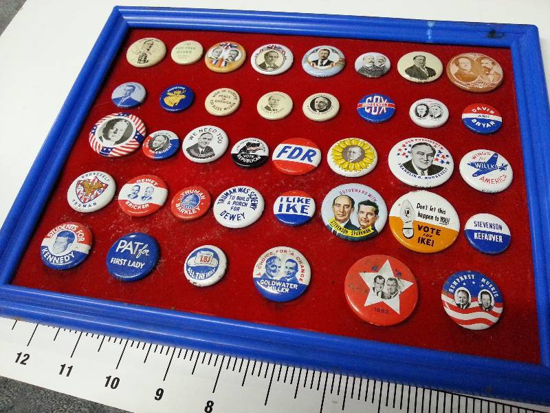 lot 1011 image: Wow what a collection of presidential hat pins.  Some old ones here and representing both political parties.