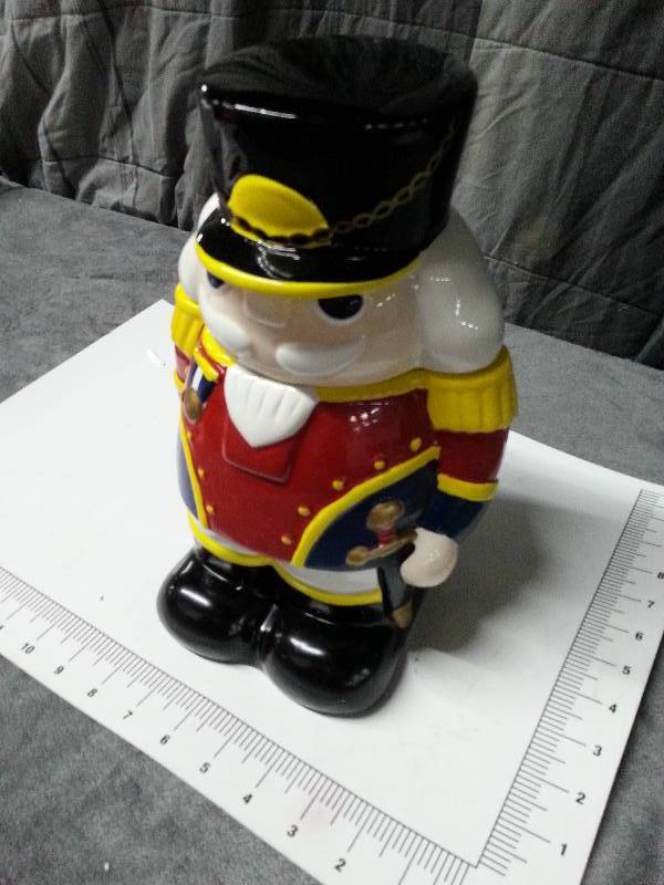 lot 1000 image: I believe its new and definitely looks cool cookie jar with a soldier from the Nut Cracker