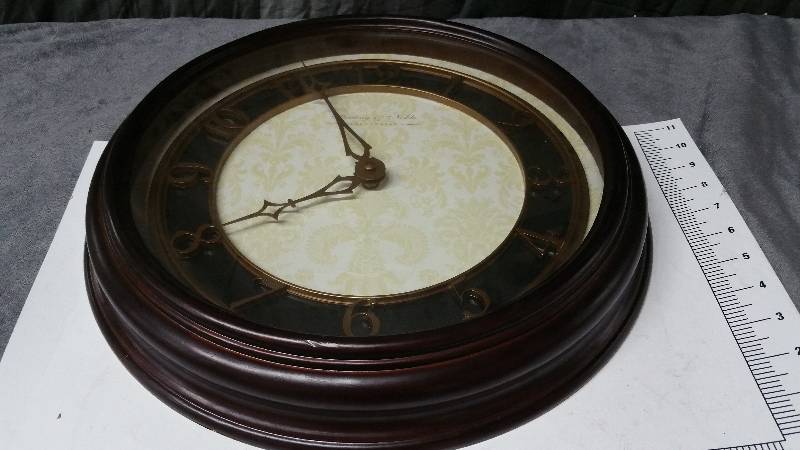 lot 1009 image: Elegant looking parlor wall mounted clock by Sterling & Noble Clock Company