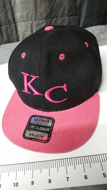 lot 1027 image: Show your colors with this cool embroidered Pink KC Royals adjustable size cap