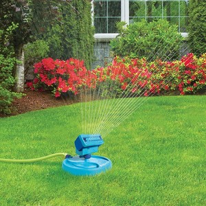 lot 2959 image: AQUA JOE - 20-Nozzle Max Coverage Adjustable Gear Driven Oscillating Sprinkler on Sled Base - Retail $24.99