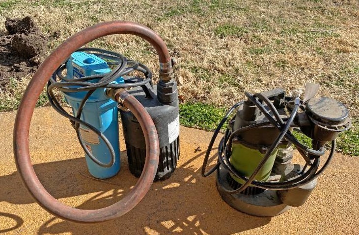 lot 2033 image: Lot of 2 Pumps - One with a Filter Both work