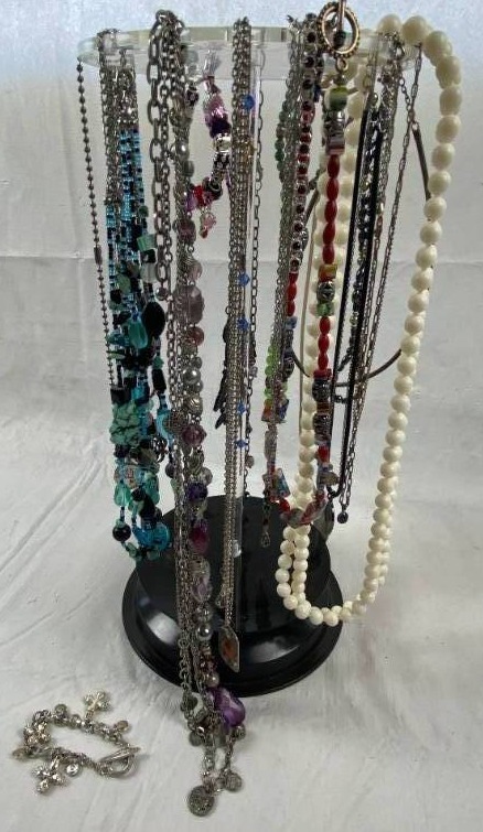 lot 6226 image: Lot of Fashion Necklaces - Some Expensive Ones Here On a Rotating Hanging Storage Rack