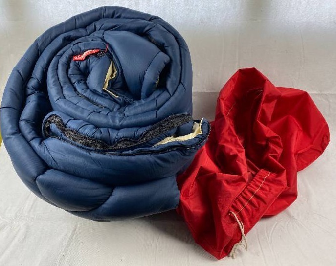 lot 6228 image: COLEMAN - Cold Weather Sleeping Bag - Size Extra Wide and Extra Long - This one was VERY expensive - w carry case. Been in storage for a bit. Not soiled, great condition, but will need cleaned.