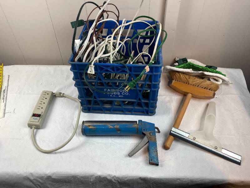 lot 6283 image: Crate w Extension Cords, Caulking Gun, & More