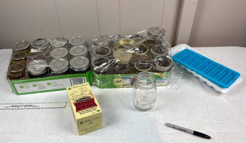 lot 6301 image: Ball Canning Jars, Box of Bands & Lids, & 2 Plastic Ice Trays