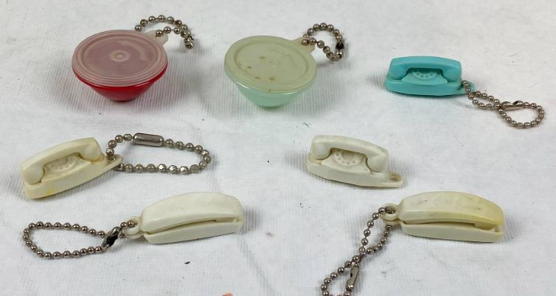 lot 6331 image: Vintage Tupperware and South Western Bell Telephone Key Chains