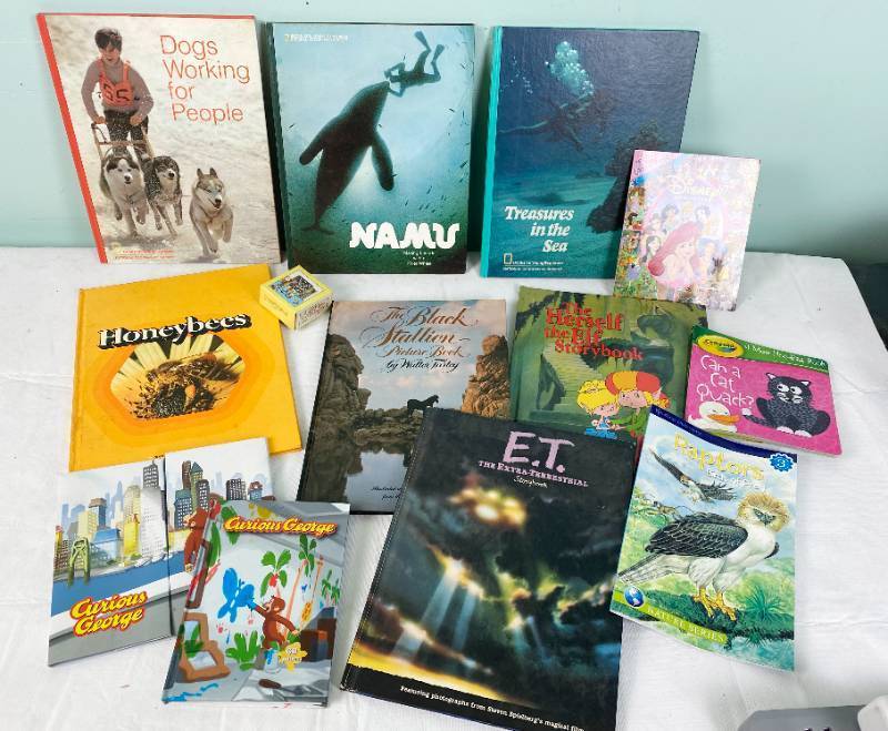 lot 6358 image: Lot of Vintage Childrens Books - E.T., Curious George, Learning Books, National Geographic and more Collectible