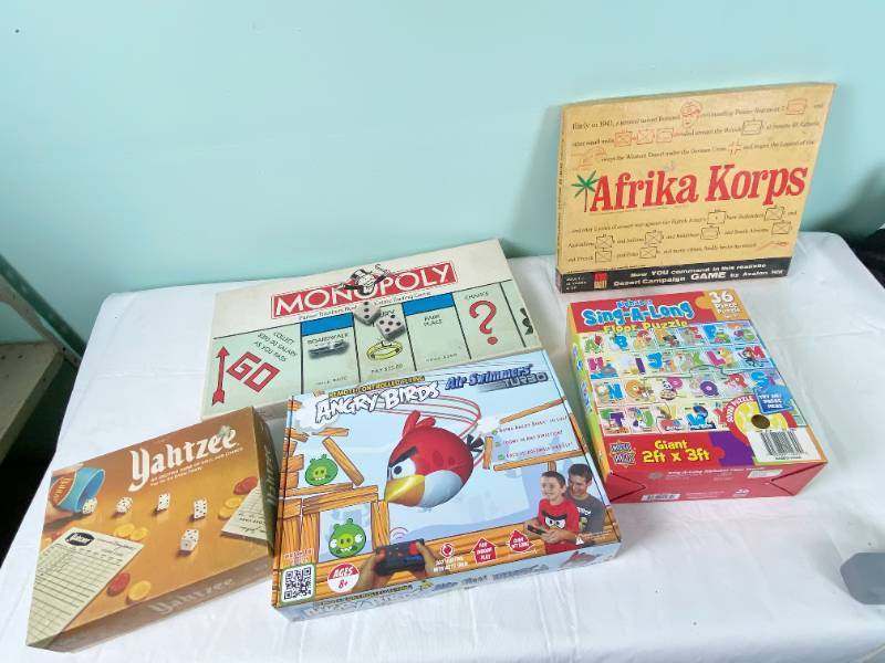 lot 6378 image: Vintage Game Afrika Corps, Yahtzee, Monopoly and newer games Angry Bird and More