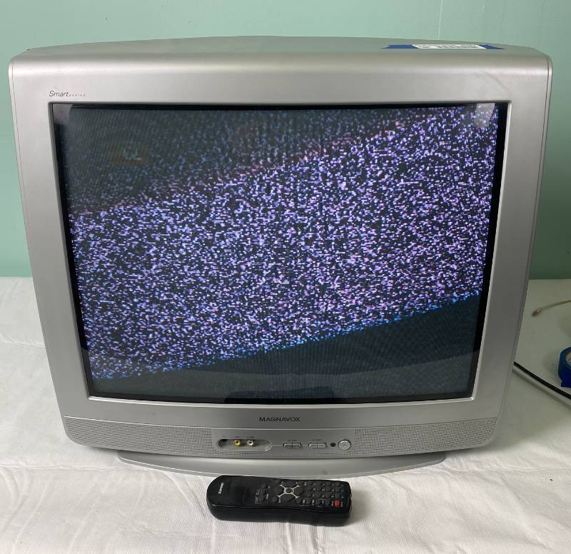 lot 6387 image: Vintage 20 Magnavox TV with Remote - This is located in the basement. Please bring help and tools to load.