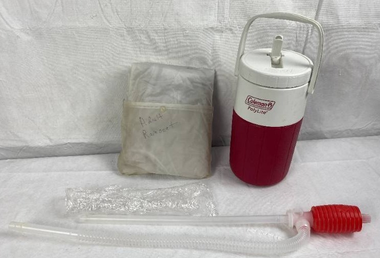 lot 9446 image: Plastic Siphon Pump, Adult Rain Coat and Coleman Drinking Jug