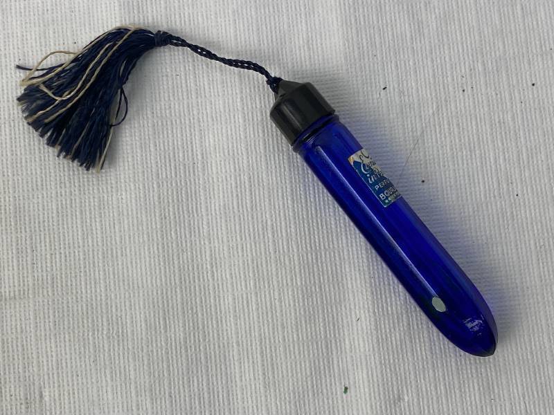 lot 9496 image: Vintage Portable Perfume Container - Blue Glass - Evening in Paris Perfume Bourjois - NEW YORK - WITH NICE TASSEL