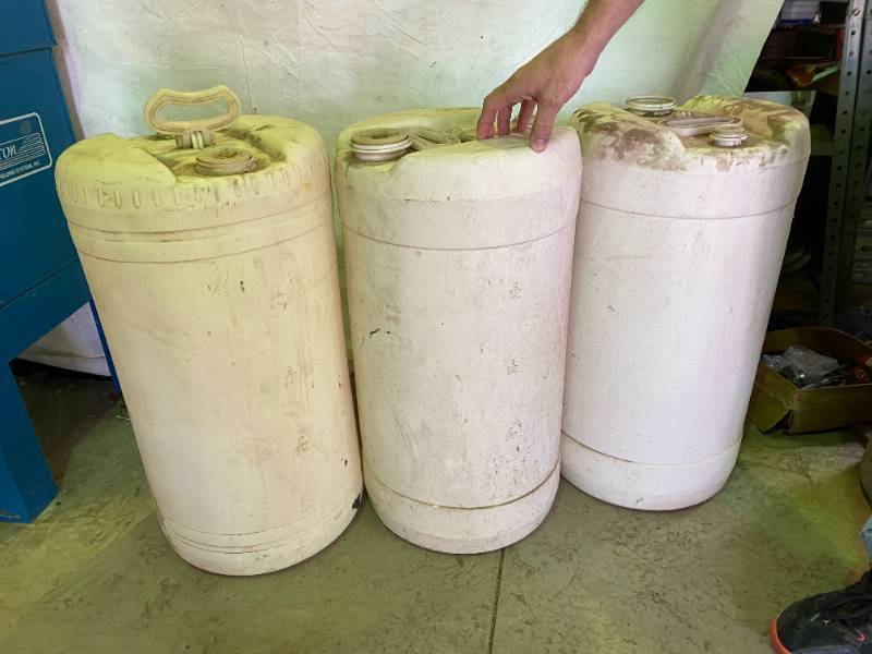 lot 9979 image: Lot of 3 Tall Liquid Storage Containers