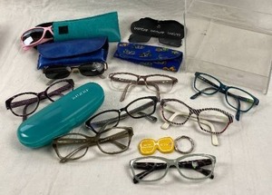 lot 6218 image: Lot of Eyeglasses Frames and a Clear Modular Holder