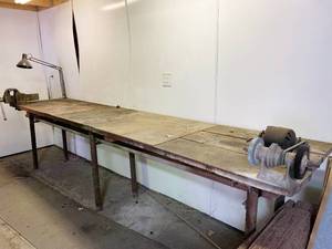 lot 6250 image: Large Shop Table with Accessories - HUGE VISE, GRINDER and Swing Arm Light - See pics for measurements - Sheet Metal Top on most of bench