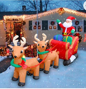 lot 5560 image: SEASONBLOW 8 Ft LED Inflatable Christmas Reindeer Pull The Sleigh with Santa claus
