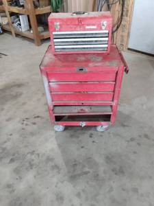 lot 2 image: 2 piece tool box Craftsman top unknown bottom Craftsman box is 20 and 12 in wide 9 in deep 12 in tall bottom box is 29 in wide 19 in deep 32 in tall