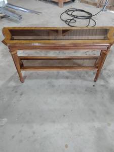 lot 7 image: wall hugging accent table with two glass shelves 54 inches wide 16 inches deep 26 in tall