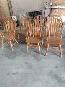 lot 11 image: 7 curved back chairs three captains four sides