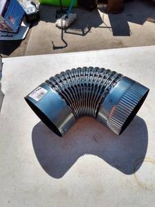 lot 42 image: new 6-in 28 gauge blue corrugated elbow