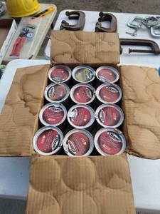 lot 151 image: 24 cans of Sterno believe there is one leaker
