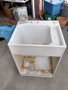 lot 194 image: new 25 in wide 22 inches deep 34 and 12 in tall utility sink and stand will need cleaned up