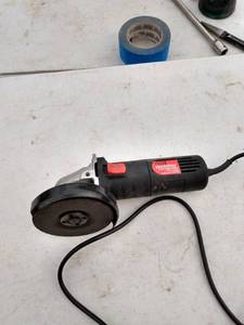 lot 211 image: like new drill master 4 12 angle grinder plugged in works great