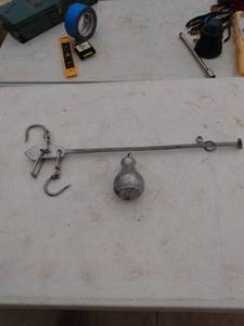 lot 228 image: antique scales with weight