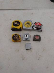 lot 257 image: 7 tape measures
