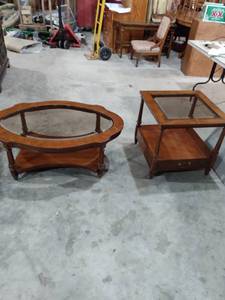 lot 297 image: Thomasville 2 piece living room table set sofa table is 44 in Long 30 in deep 17 in tall with glass top side table is 24 in 23 inches tall has drawer and glass top