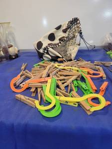 lot 1076 image: Wooden and plastic close pens with bag